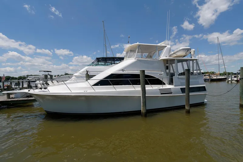 Slide: The Image of 1994 Ocean Yachts 44 Aft Cabin Motor Yacht docked at marina. - 3