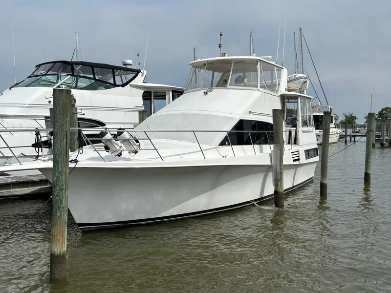 Slide: The Image of 1994 Ocean Yachts 44 Aft Cabin Motor Yacht docked at marina. - 5