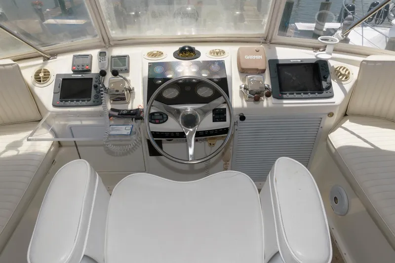 Slide: The Image of 1994 Ocean Yachts 44 Aft Cabin Motor Yacht helm with navigation equipment and controls. - 9