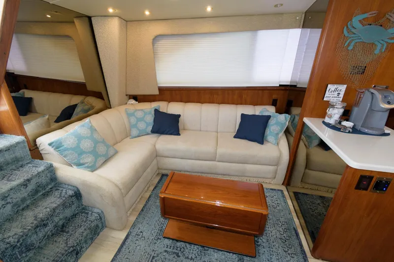 Slide: The Image of 1994 Ocean Yachts 44 Aft Cabin Motor Yacht interior with cozy seating and coffee station. - 13