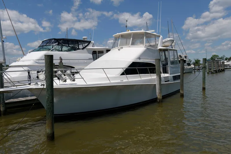 Slide: The Image of 1994 Ocean Yachts 44 Aft Cabin Motor Yacht docked at marina. - 4