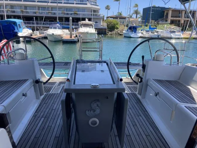 Slide: The Image of Cockpit view of 2014 Beneteau Oceanis 45 sailboat docked at marina. - 24