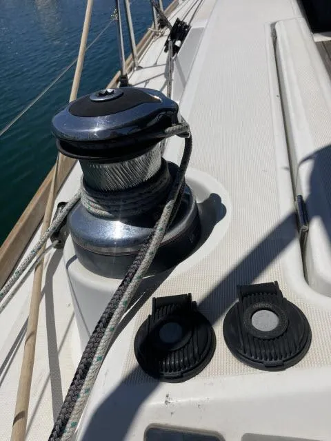 Slide: The Image of Winch and rope on deck of 2014 Beneteau Oceanis 45 sailboat. - 29