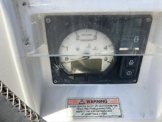 Slide: The Image of Engine gauge panel of a 2014 Beneteau Oceanis 45 sailboat with warning label. - 31