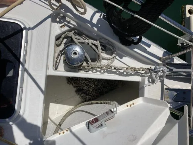 Slide: The Image of Anchor locker of a 2014 Beneteau Oceanis 45 sailboat with chain and windlass. - 41