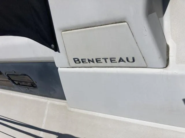 Slide: The Image of 2014 Beneteau Oceanis 45 yacht exterior detail with brand logo. - 49