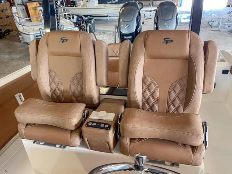 Slide: The Image of 2025 Sea Pro 322 Offshore boat with luxurious brown leather seats. - 5
