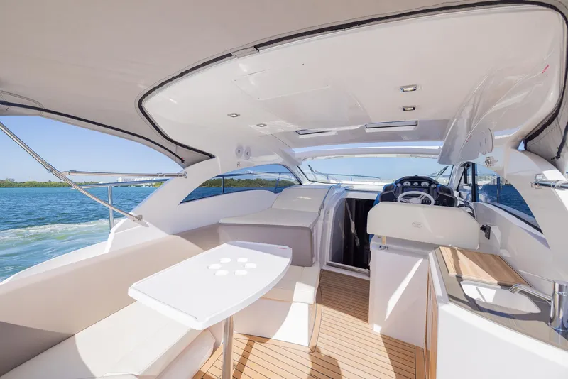 Slide: The Image of Luxurious 2024 Sessa Marine C36 OB yacht interior with sleek design and spacious seating. - 15