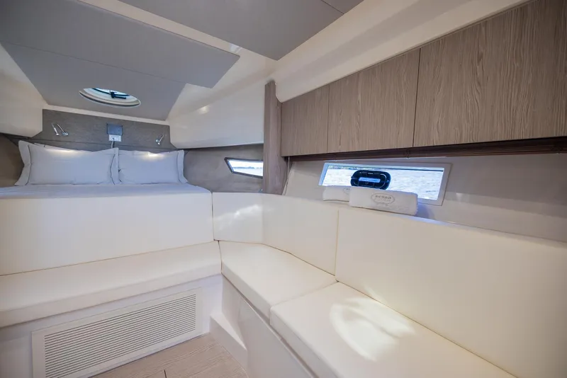 Slide: The Image of Luxurious interior of 2024 Sessa Marine C36 OB yacht cabin with modern furnishings. - 29