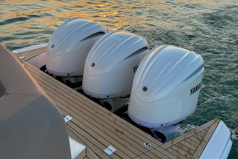 Slide: The Image of 2024 Sessa Marine C36 OB with triple Yamaha outboard engines on teak deck. - 3