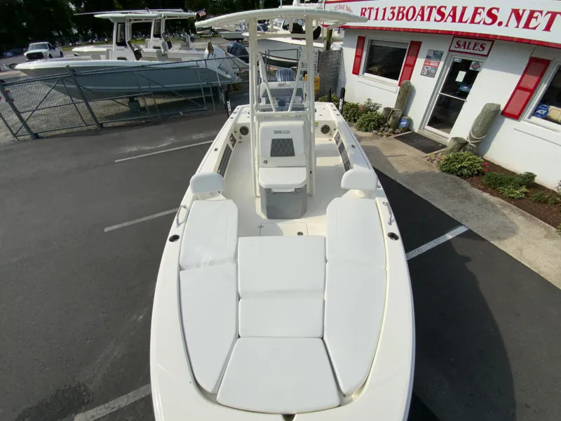 Slide: The Image of 2024 Pathfinder 2200 TRS boat displayed at a dealership. - 17