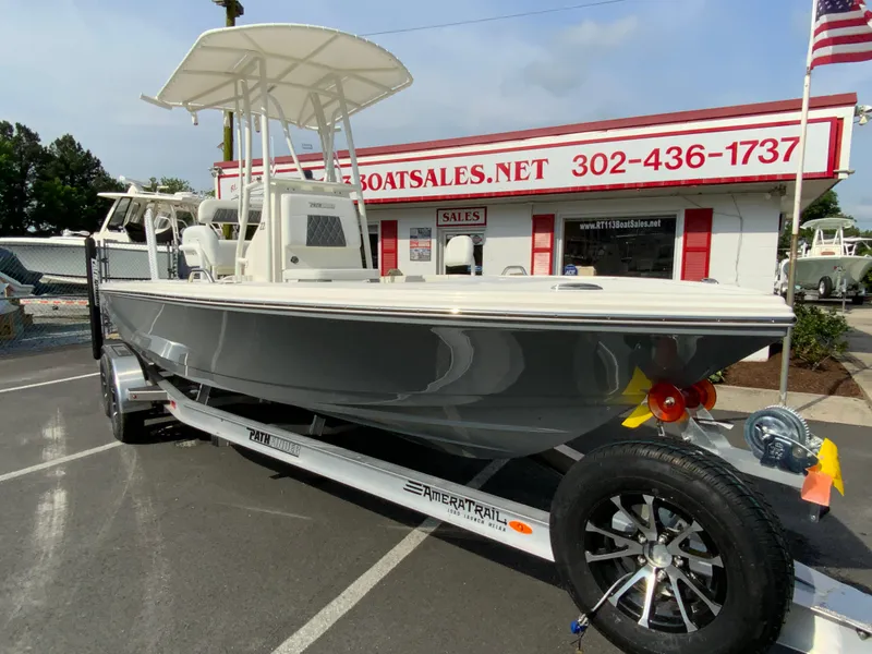 Slide: The Image of 2024 Pathfinder 2200 TRS boat on trailer at dealership. - 3