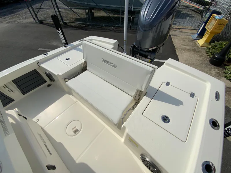 Slide: The Image of 2024 Pathfinder 2200 TRS boat interior with seating and storage compartments. - 31