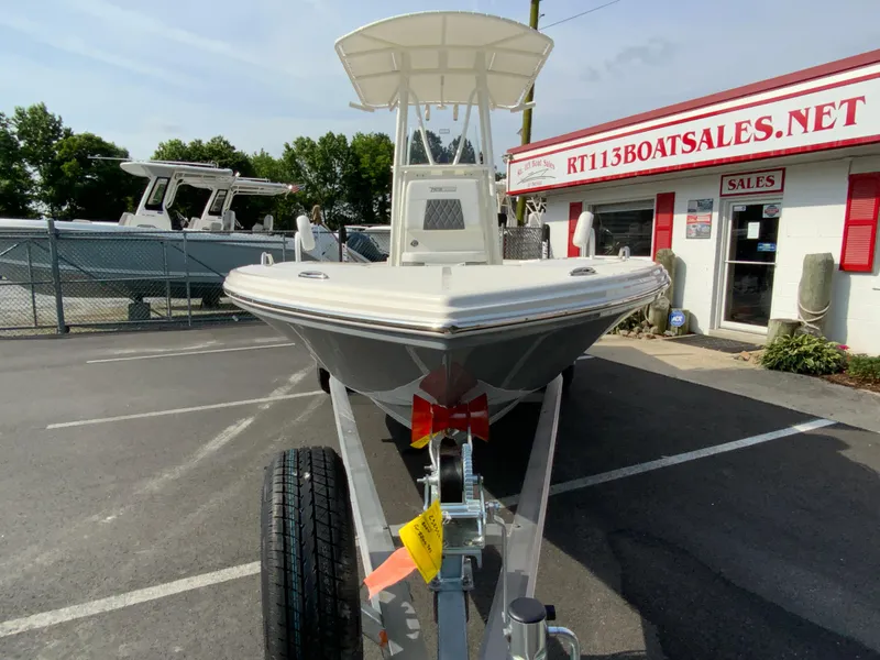 Slide: The Image of 2024 Pathfinder 2200 TRS boat on trailer at dealership. - 4