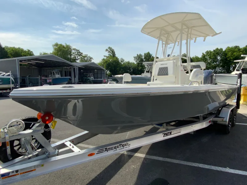 Slide: The Image of 2024 Pathfinder 2200 TRS boat on AmeraTrail trailer in outdoor lot. - 5