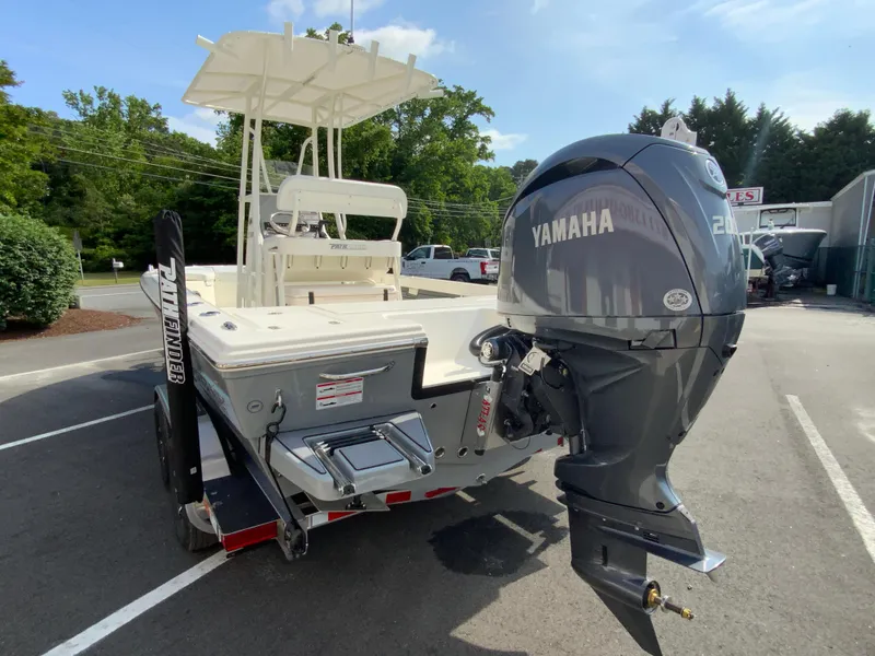 Slide: The Image of 2024 Pathfinder 2200 TRS boat with Yamaha 200 outboard motor on trailer. - 8