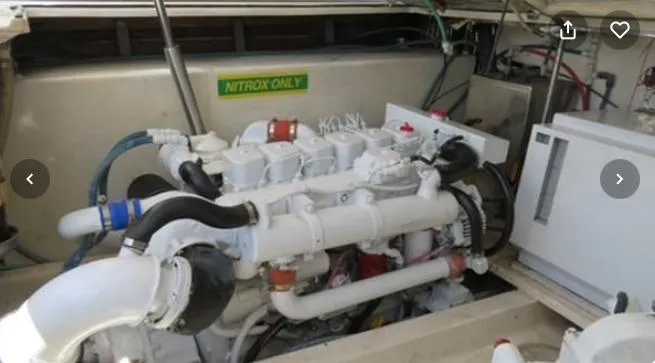 Slide: The Image of Engine compartment of a 2001 Topaz Express boat with visible Nitrox system. - 44