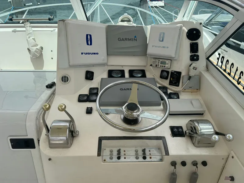Slide: The Image of Control panel of a 2001 Topaz Express boat with Garmin and Furuno equipment. - 6