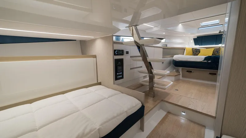 Slide: The Image of Interior of 2025 Fiart 35 Seawalker yacht with modern design and cozy sleeping area. - 11