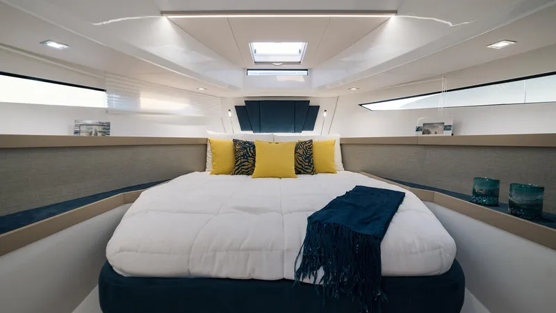 Slide: The Image of Luxurious cabin interior of the 2025 Fiart 35 Seawalker yacht with cozy bedding. - 6