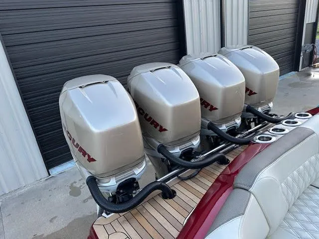 Slide: The Image of 2020 Nor-Tech 390 Sport Center Console with quad Mercury outboard engines. - 3