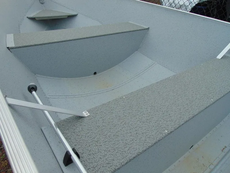 Slide: The Image of 2024 Crestliner 1672 Outreach interior view with bench seats. - 4