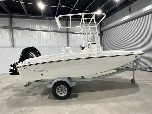 Slide: The Image of 2024 Bayliner T18BAY Trophy boat in a showroom. - 3