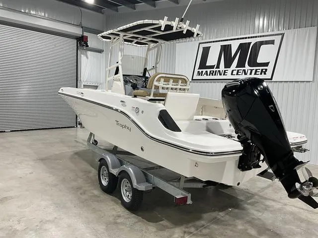 Slide: The Image of 2024 Bayliner T22CC boat on trailer at LMC Marine Center showroom. - 5