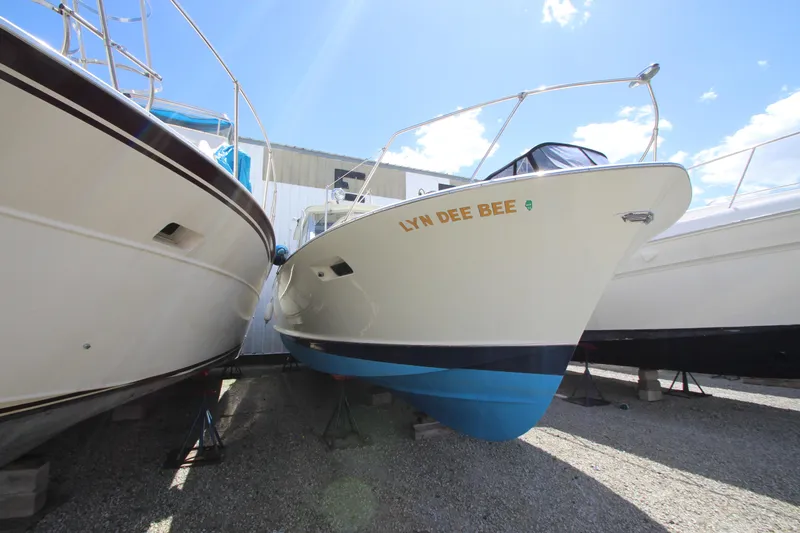 Slide: The Image of 1965 Chris-Craft Commander boat named Lyn Dee Bee in dry dock. - 3