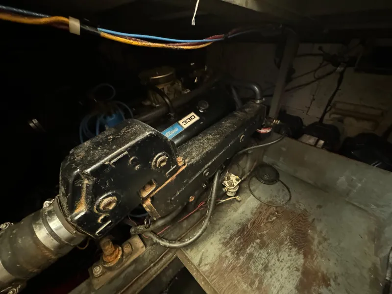 Slide: The Image of 1965 Chris-Craft Commander engine compartment with visible wiring and components. - 46