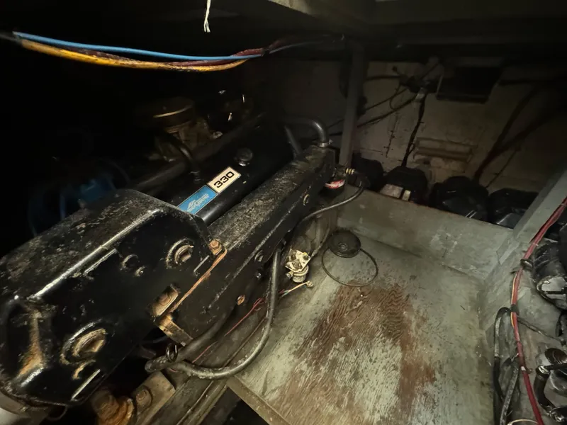 Slide: The Image of 1965 Chris-Craft Commander engine compartment with visible wiring and components. - 47