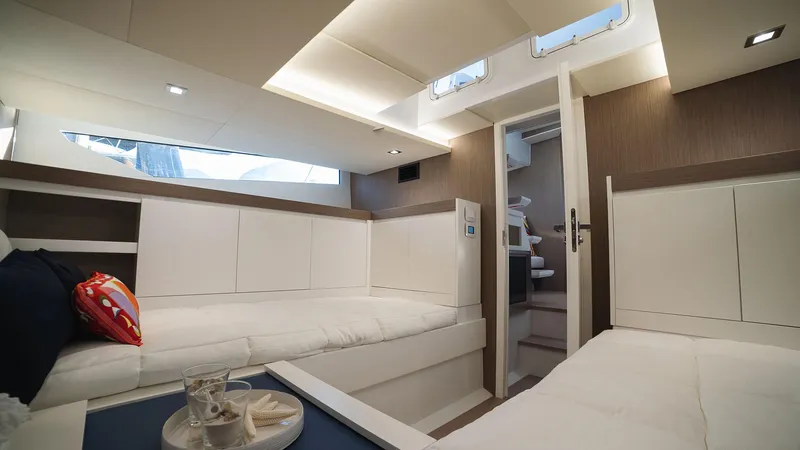 Slide: The Image of Interior cabin of 2025 Fiart 43 Seawalker yacht with modern white decor. - 12