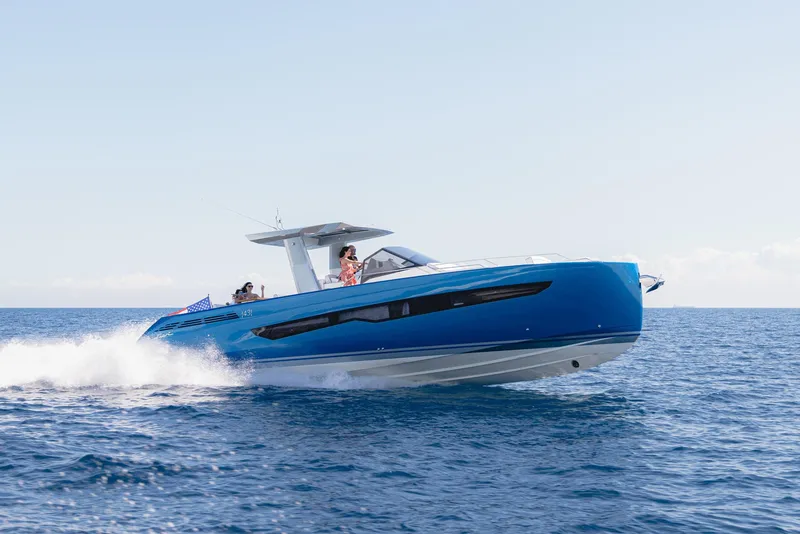Slide: The Image of 2025 Fiart 43 Seawalker luxury yacht cruising on open water. - 2