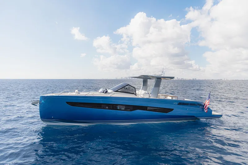 Slide: The Image of 2025 Fiart 43 Seawalker yacht on open sea under blue sky. - 4