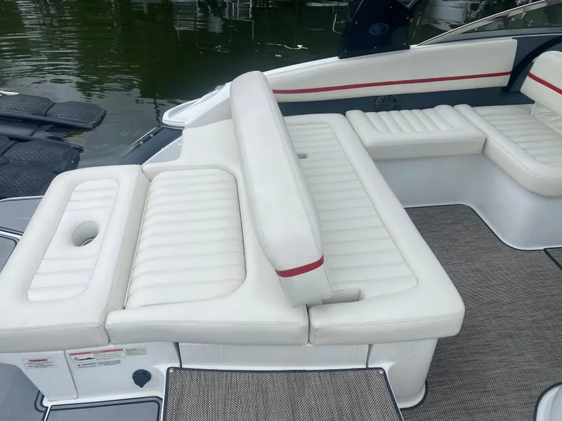 Slide: The Image of 2016 Cobalt R5 WSS boat with white leather seating and red accents. - 4