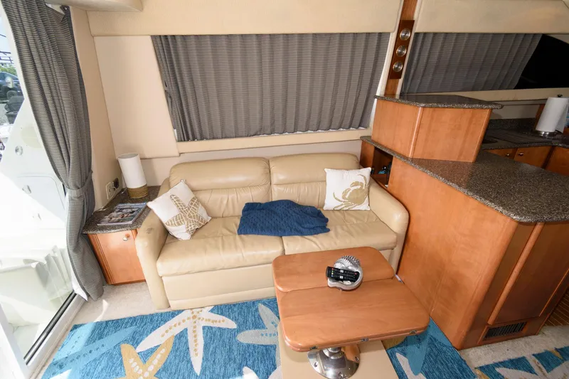 Slide: The Image of Interior of 2004 Meridian 381 Sedan with beige leather sofa and wooden cabinetry. - 15