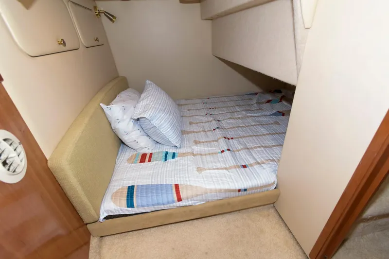 Slide: The Image of Small cozy sleeping area in a 2004 Meridian 381 Sedan yacht. - 22