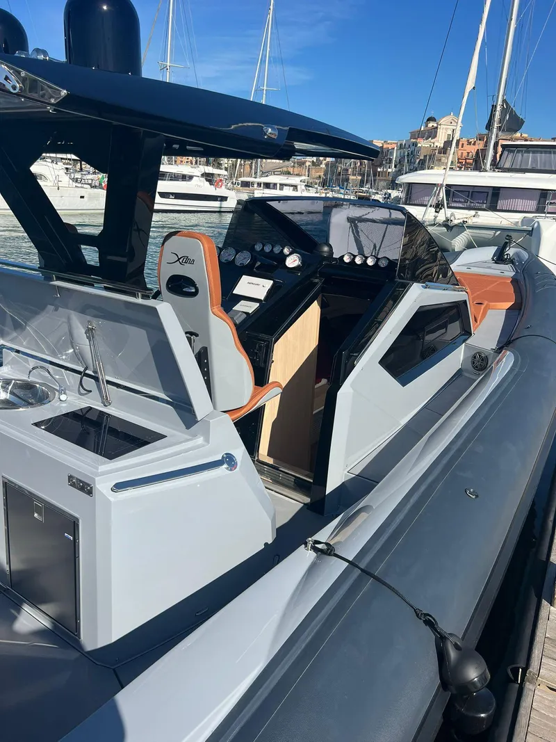 Slide: The Image of 2025 DNA 46 luxury yacht with modern cockpit and sleek design. - 17