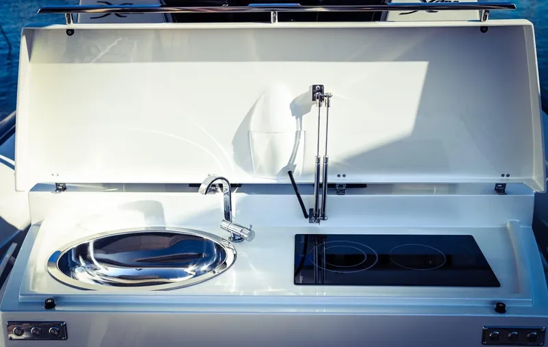 Slide: The Image of Modern outdoor kitchen on DNA 46 yacht, 2025 model, featuring sink and stove. - 20