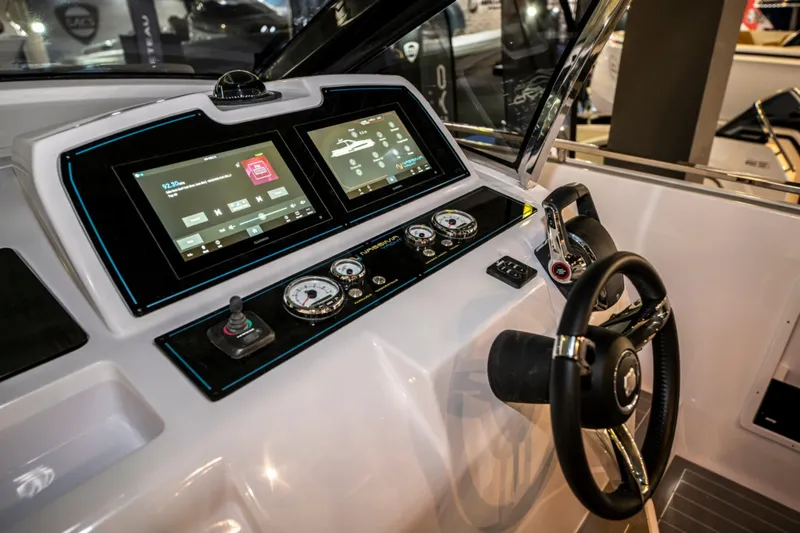 Slide: The Image of Nassima Yacht N40 2025 model cockpit with advanced navigation and control systems. - 11