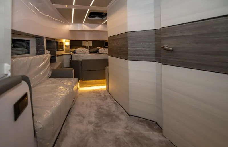Slide: The Image of Luxurious interior of 2025 Nassima Yacht N40 with modern design and ambient lighting. - 28