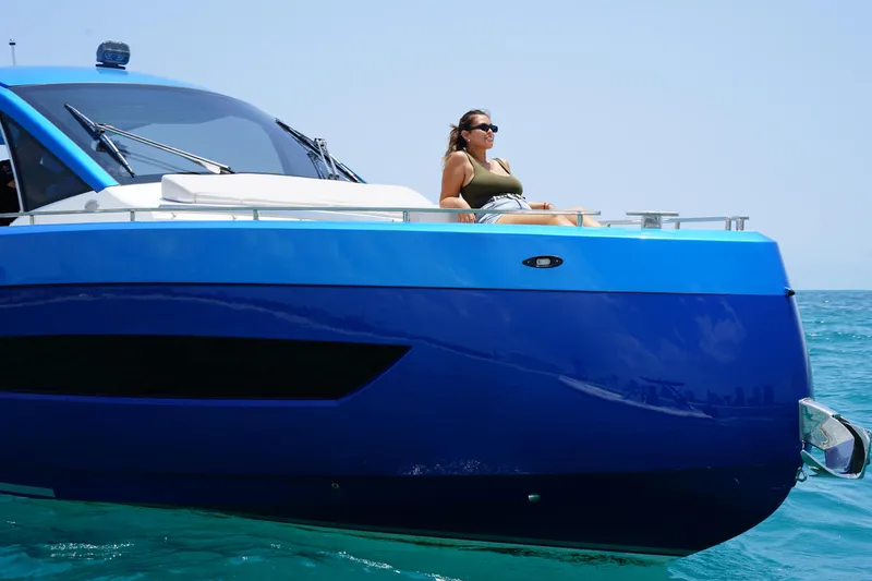Slide: The Image of Woman relaxing on a 2025 Nassima Yacht N40 in the ocean. - 3