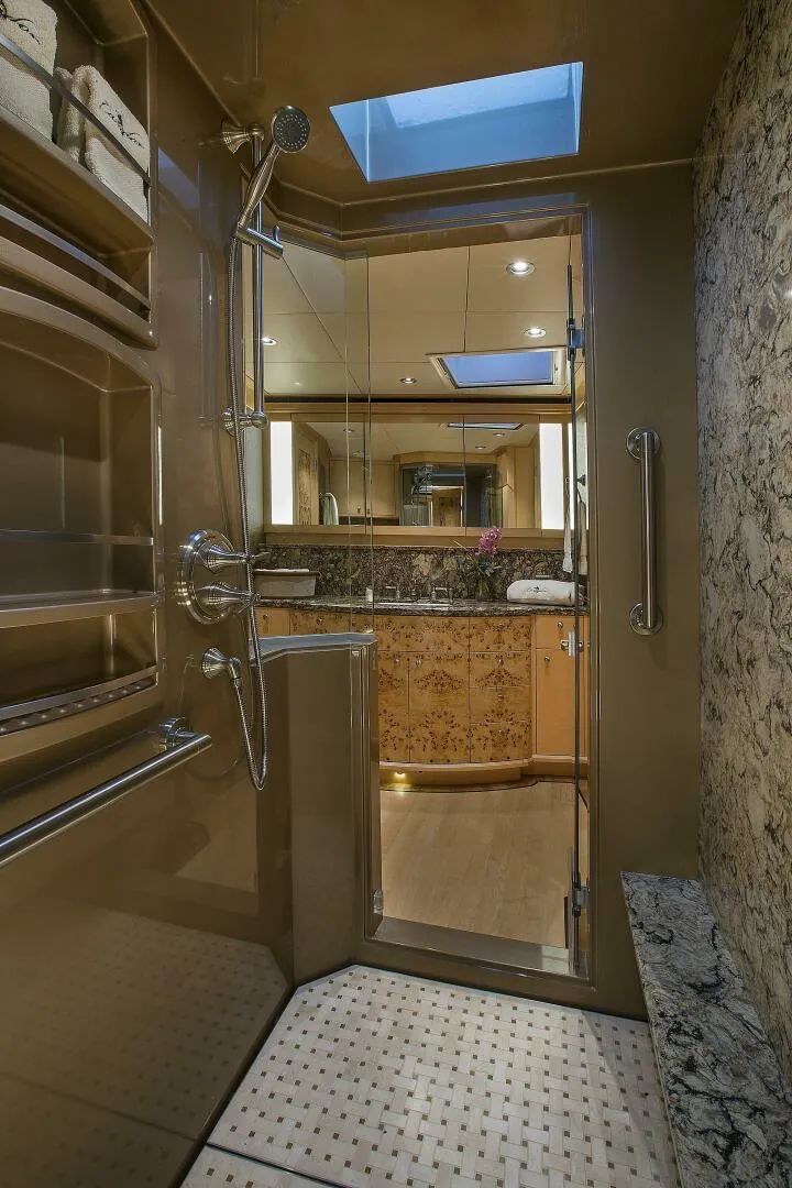Slide: The Image of Luxurious bathroom in a 2019 Nordlund Expedition Yachtfisher with modern fixtures and skylight. - 11