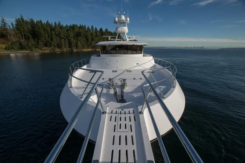 Slide: The Image of 2019 Nordlund Expedition Yachtfisher on calm waters with forested shoreline. - 19