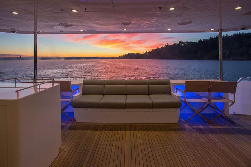 Slide: The Image of Luxurious 2019 Nordlund Expedition Yachtfisher deck with sunset view over the water. - 31