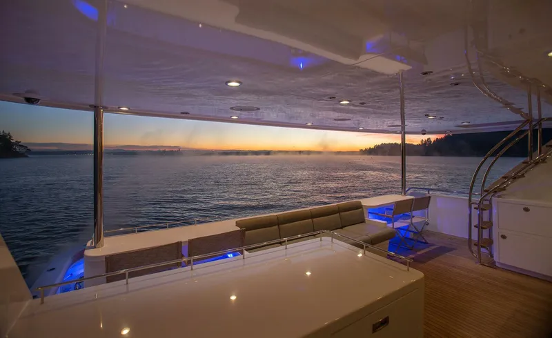 Slide: The Image of Luxurious 2019 Nordlund Expedition Yachtfisher at sunset, featuring spacious deck and serene ocean view. - 34