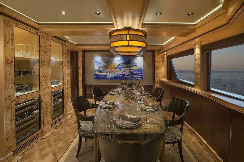 Slide: The Image of Luxurious dining area on 2019 Nordlund Expedition Yachtfisher with ocean view and elegant decor. - 4