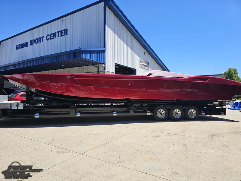 The Image of Red 2010 MTI 44 Corvette boat on trailer at Grand Sport Center. - 0
