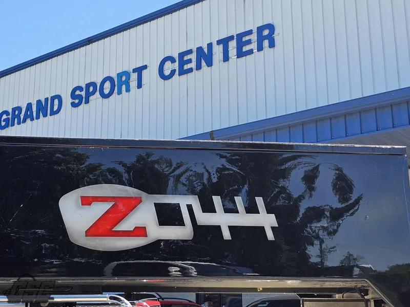 Slide: The Image of Red 2010 MTI 44 Corvette boat on trailer at service center. - 10