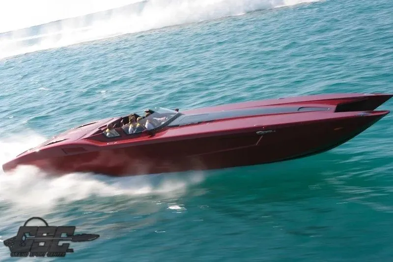 Slide: The Image of 2010 MTI 44 Corvette speedboat racing on the ocean. - 100